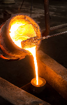 Molten gold doré pour showing recovered gold