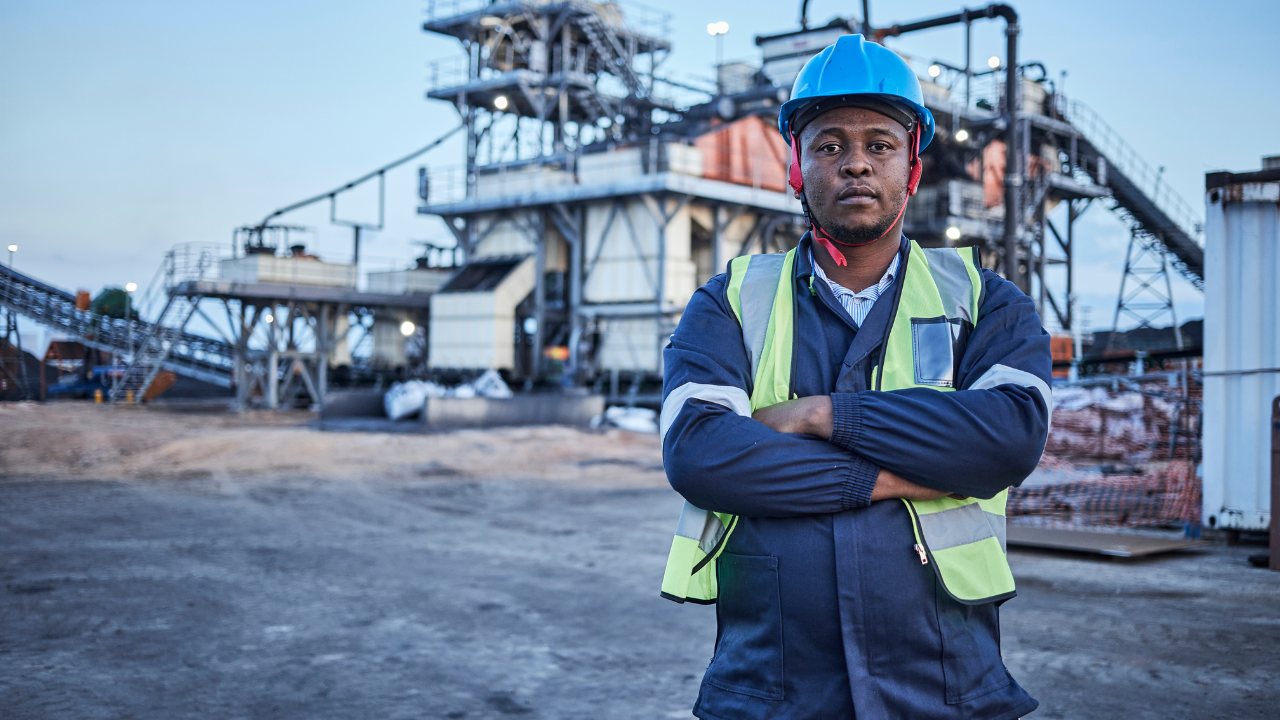 Minerra Ghana gold tailings processing plant worker
